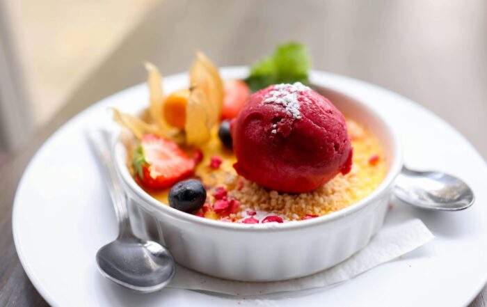 Crème Brûlée with strawberry sorbet